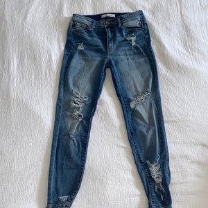 Medium wash distressed stretch skinny jeans. Sz 28
